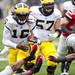 Michigan senior quarterback Denard Robinson runs toward the end zone in the first half against Ohio State on Saturday. Daniel Brenner I AnnArbor.com